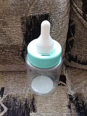 4/$40 Clear Baby Bottle Coin Bank with Mint Green Cap and White Nipple